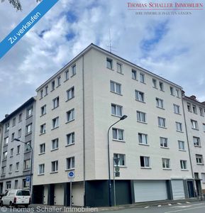 Gepflegtes Mehrfamilienhaus mit 15 Wohneinheiten, Gewerbeeinheit und Garagen in Top-Wohnlage