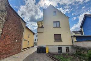 Solide Kapitalanlage mit Ausbaupotenzial – vermietetes Einfamilienhaus mit großer Scheun, Grundstück – Hauptstraße 44, 65558 Flacht – Vorschaubild 4
