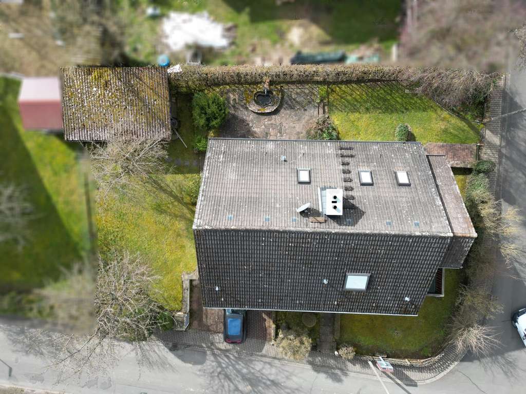 Immobilie in Marktheidenfeld - Ein Zuhause, das mit Ihrer Familie wächst – vielseitiges Einfamilienhaus mit Garten und separaten Wo - Bild 4