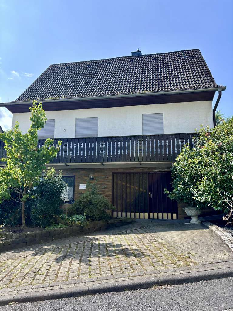 Freistehendes Einfamilienhaus mit wunderschönem Garten, Garage/Carport in ruhiger Lage von Kürten
