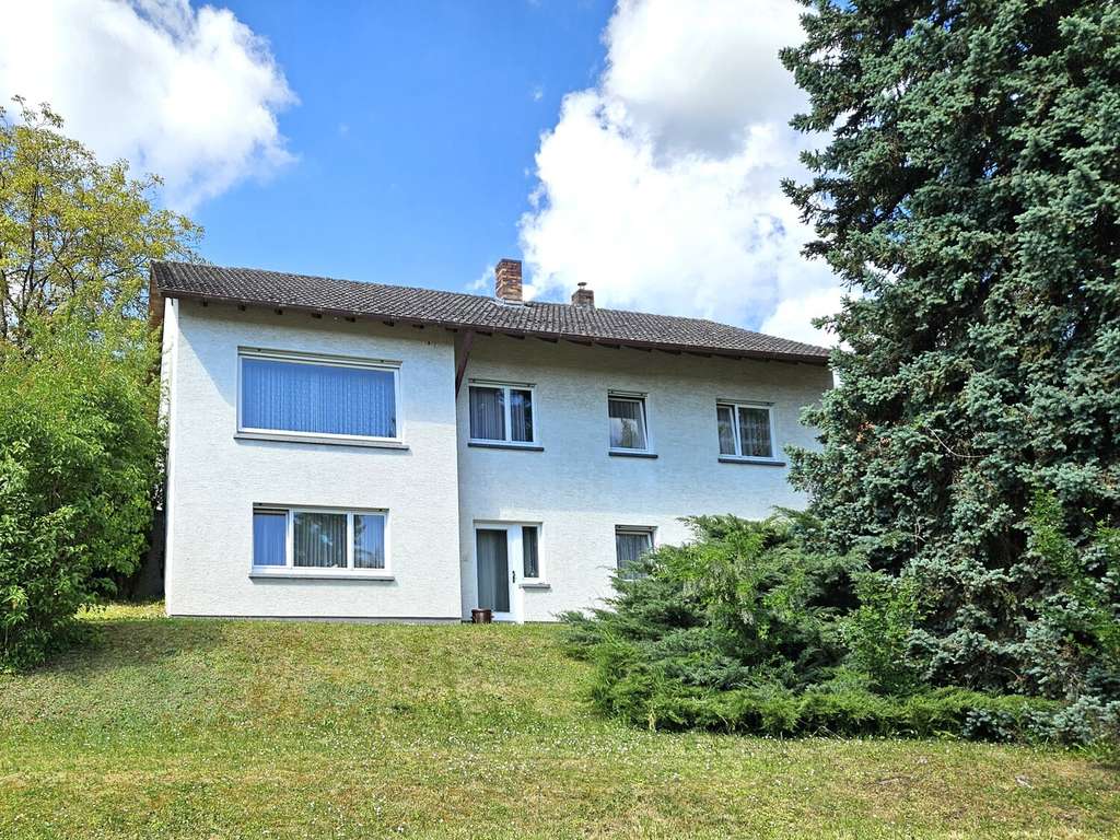 Immobilie in Rimpar - Einfamilienhaus mit Einliegerwohnung in ruhiger Lage zu verkaufen - Bild 0