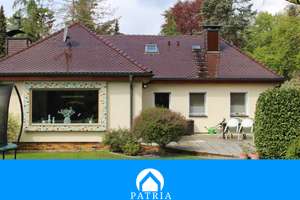 Einfamilienhaus mit großem Garten in idyllischer Lage