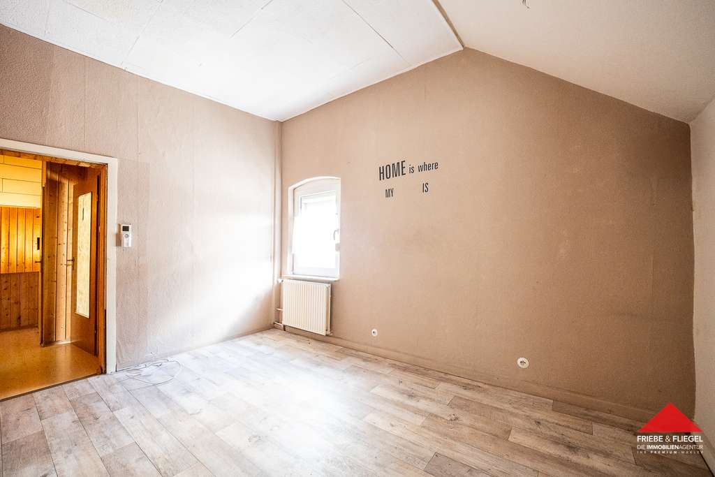 Immobilie in Dortmund - Einfamilienhaus mit Anbau und zwei Kfz-Stellplätzen in ruhiger Sackgassenlage - Bild 4