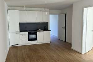 Attraktive 3-Zimmer-Wohnung mit Einbauküche, Terrasse und Tiefgaragenplatz zu vermieten