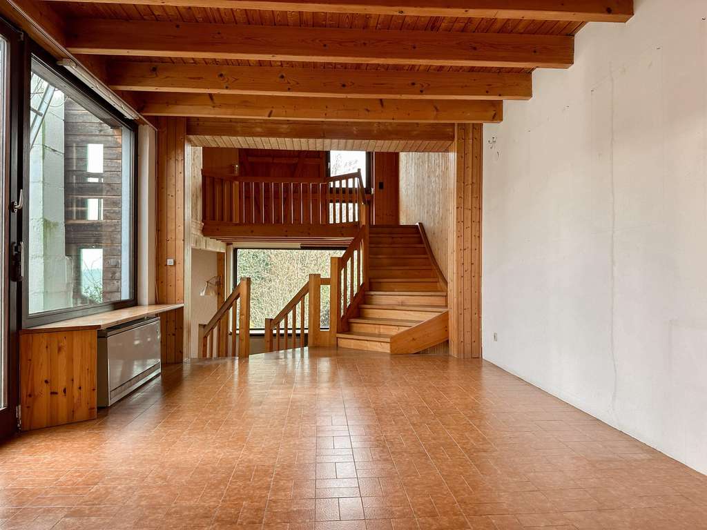 Immobilie in Baltmannsweiler - Viel Platz für die Familie - Bungalow mit Terrasse und schönem Blick ins Grüne - Bild 1