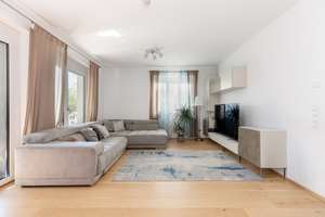 Moderne Drei-Zimmer-Erdgeschosswohnung mit Gartenanteil in Südwest-Ausrichtung
