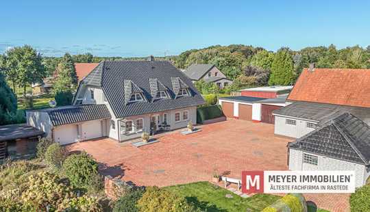 Bild von Familienfreundliches Einfamilienhaus mit separater Gewerbefläche in Jaderberg (Obj.-Nr. 6536)