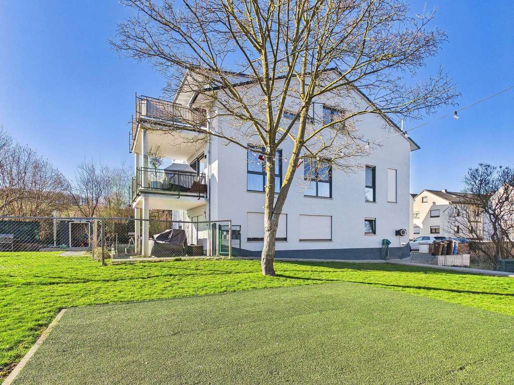 Immobilie in Hünfelden - Kapitalanlage mit Zukunft: Gepflegtes Mehrfamilienhaus Baujahr 2017 - Bild 1