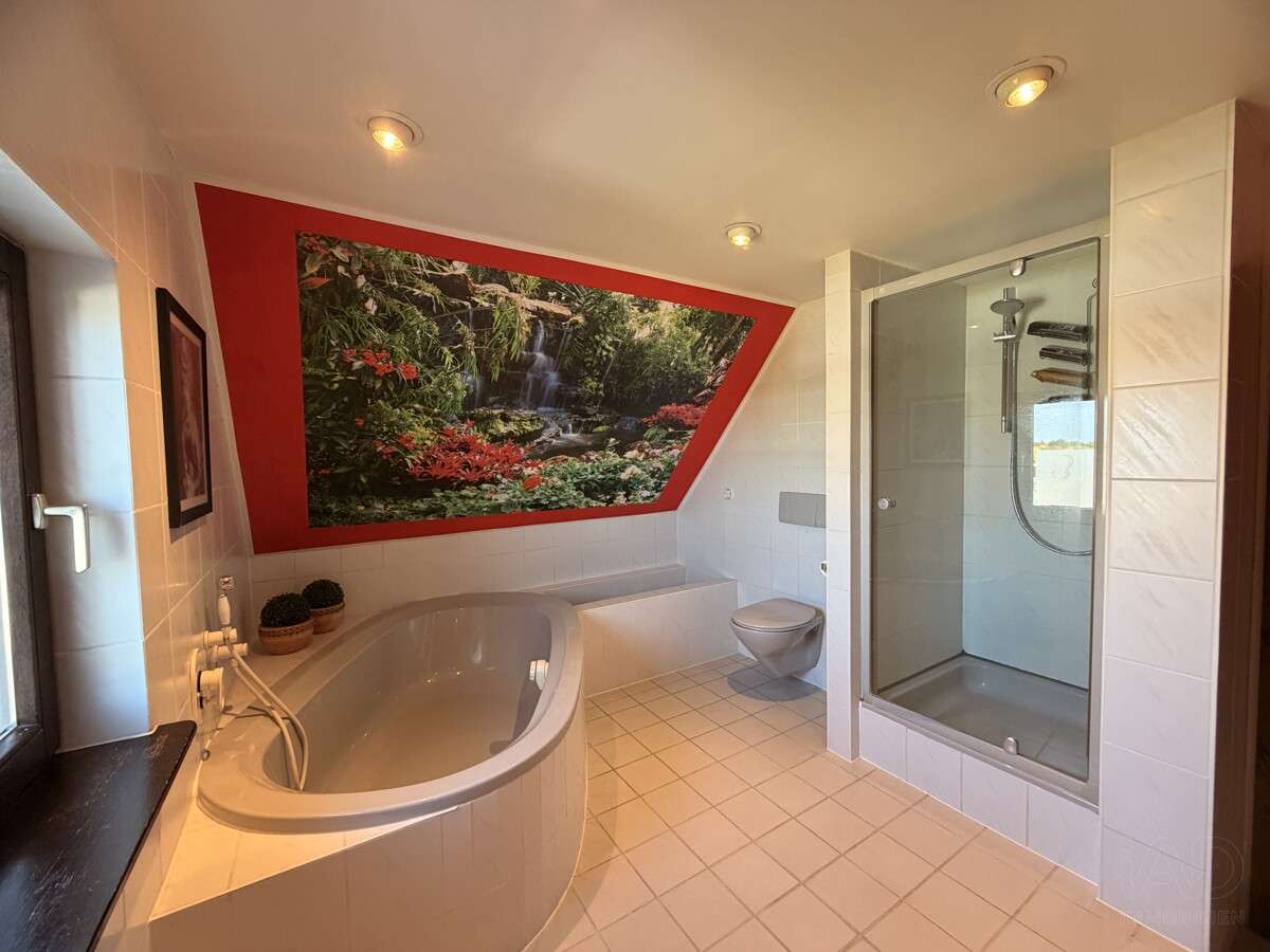 Immobilie in Kirchheim bei München - Schlossburg-Charakter trifft mediterranes Wohngefühl – außergewöhnliche Maisonette auf zwei Ebenen - Bild 1