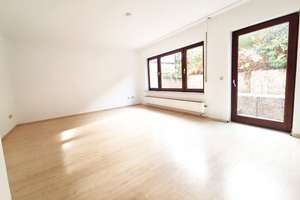 Freundliche 2,5-Zimmer-Wohnung mit Terrasse und Garten in idyllischer Wohnlage