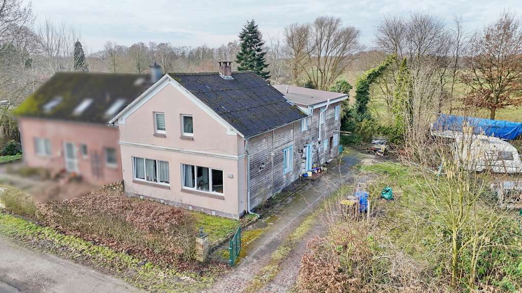 Immobilie in Heidgraben - Einfamilienhaus mit vielseitiger Nutzungsmöglichkeit auf großzügigem Grundstück in Heidgraben - Bild 1