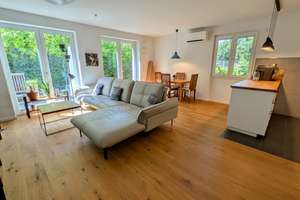 Barrierefreie, exklusiv ausgestattete 3-Zimmer-Erdgeschosswohnung mit Sonnenterrasse & Privatgarten