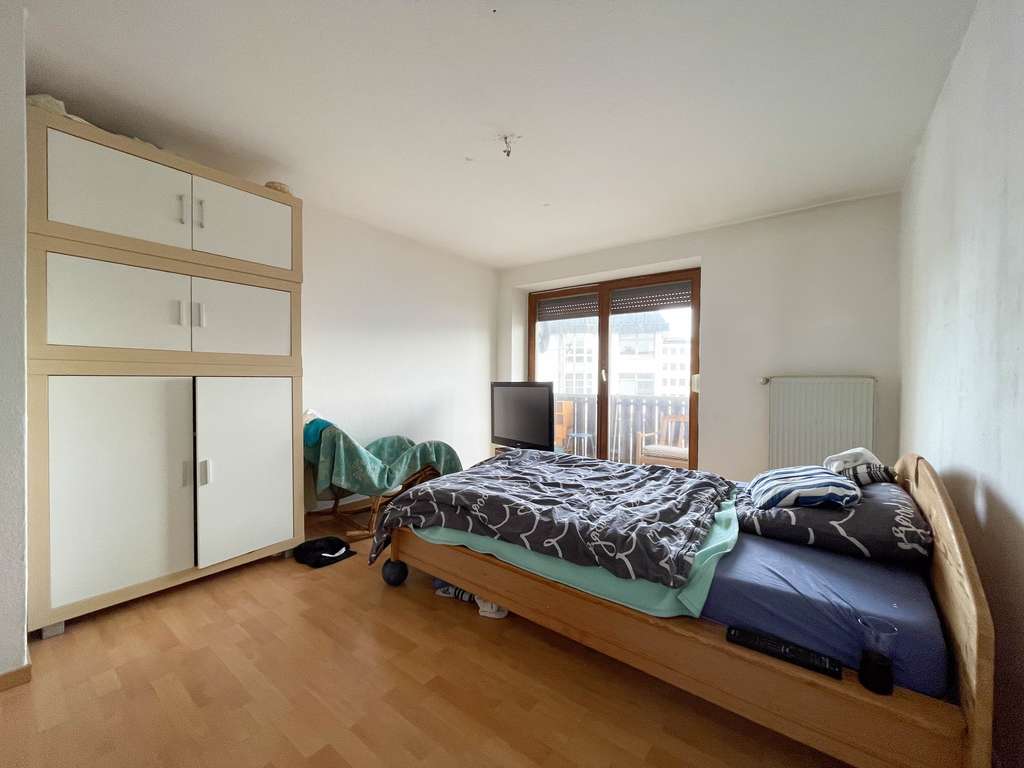 Immobilie in Altötting - Charmante 3-Zimmer-Wohnung mit Balkon und Potential - Bild 2