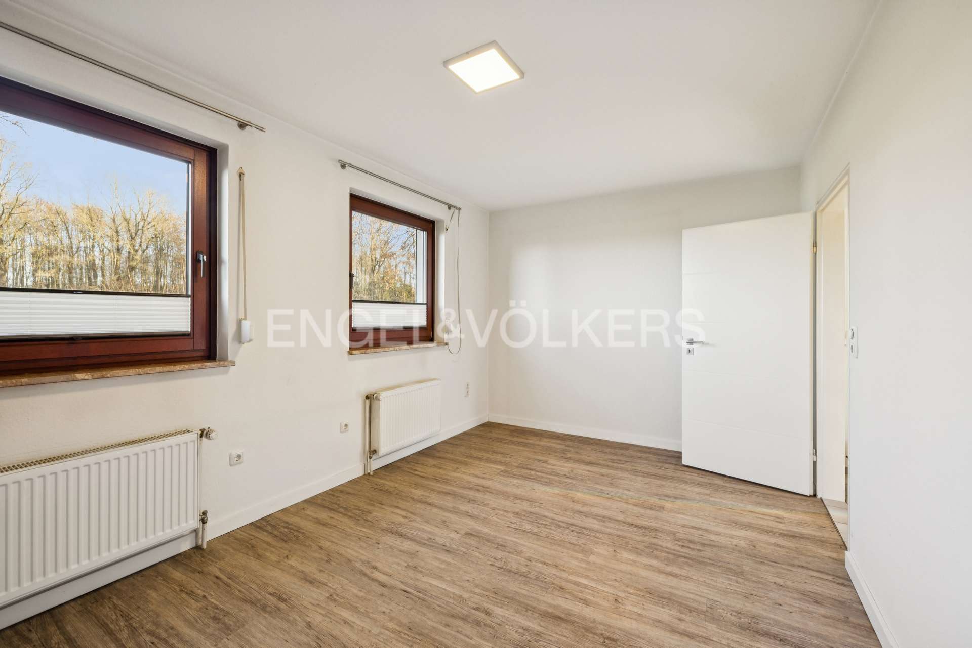 Immobilie in Hoisdorf - Gemütliches Einfamilienhaus mit großem Grundstück in Feldrandlage - Bild 0