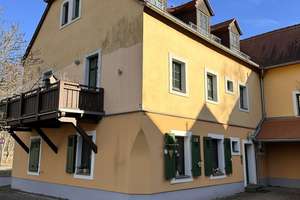 Elbnatur im Blick – Moderne 2‑Zimmer‑Wohnung im historischen Dreiseitenhof