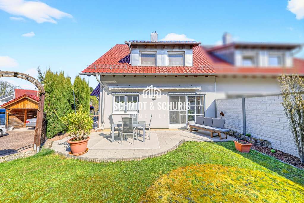 Immobilie in Walzbachtal - Gepflegte Doppelhaushälfte in ruhiger Lage mit schönem Garten und Ausbaupotenzial - Bild 1