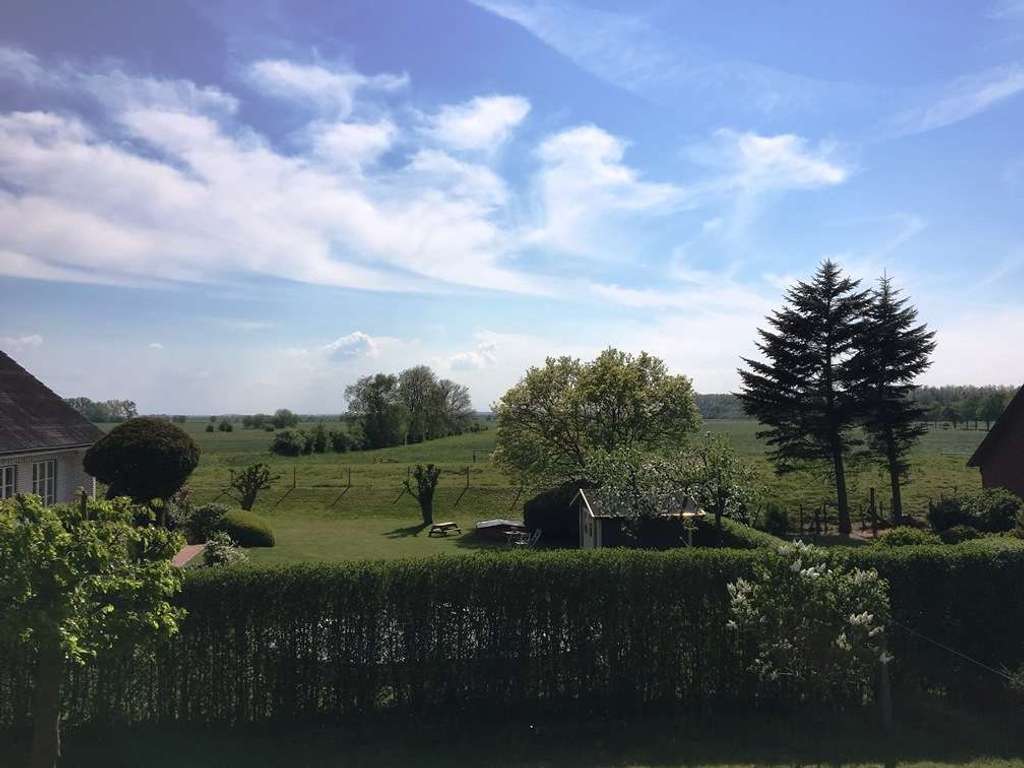 Immobilie in Hetlingen - „Wohnen mit Weitblick. Traumwohnung mit einzigartigem Blick in die Elbmarsch“ - Bild 1