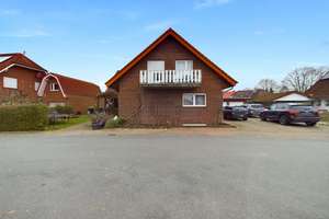 TOP-INVESTMENT: FAMILIENFREUNDLICHES MFH IN SACKGASSENLAGE MIT GARTEN, TERRASSE, BALKONEN & GARAGEN! – Die vollständige Adresse der Immobilie erhältst du vom Anbieter., 49434 Neuenkirchen-Vörden – Vorschaubild 2