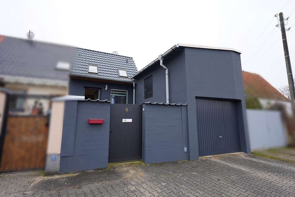 Immobilie in Niedere Börde - Groß Ammensleben- saniertes Reihenendhaus auf kleinem Grundstück mit Garage in ruhiger Lage ! - Bild 1