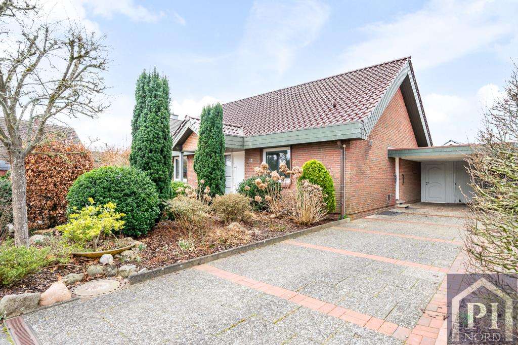 Immobilie in Westerrönfeld - Stilvoll modernisiertes Einfamilienhaus mit Doppelcarport und traumhaftem Garten - Bild 0