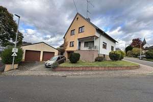 Zweifamilienhaus mit 2 Garagen und Stellplatz in zentraler Ortslage – Die vollständige Adresse der Immobilie erhältst du vom Anbieter., 55776 Ruschberg – Vorschaubild 2