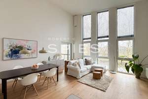 Großzügiges 4-Zimmer- Penthouse mit moderner Architektur und Blick auf den Küstenkanal