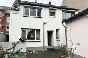 Einseitig-angebautes solides Ein-bis Zweifamilienhaus in Duisburg Alt-Homberg mit Garage