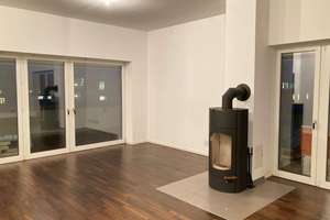 LIST-PELIKAN | luxuriöse 2-Zimmer-Wohnung mit Sauna, Einbauküche, Dachterrasse und Kaminofen