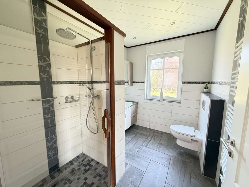 Immobilie in Landesbergen - Familienfreundliches Schwedenhaus mit Wohlfühlcharakter und eigenem  Gartenparadies - Bild 4