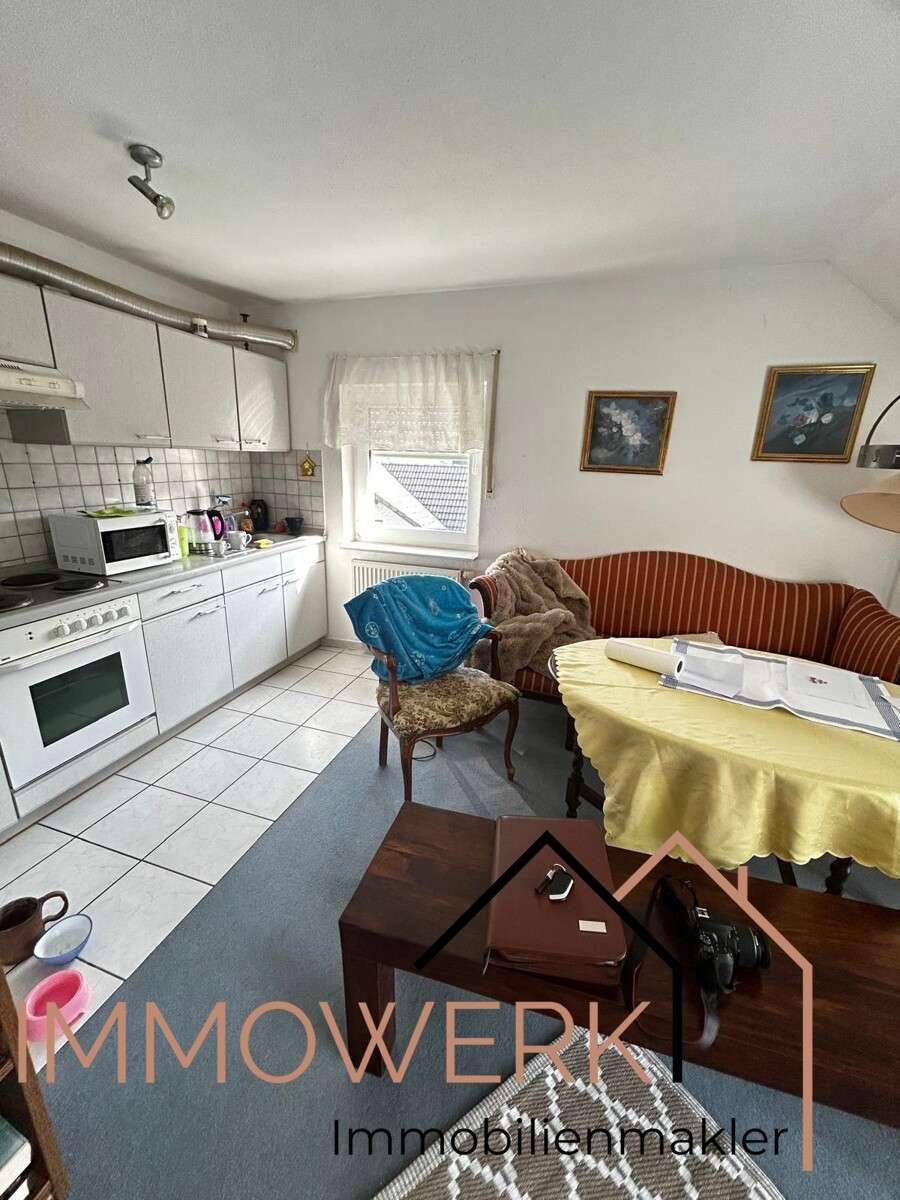 Immobilie in Luhden - Schön geschnittene, voll vermietete DG-Wohnung mit Balkon und Stellplatz. - Bild 0