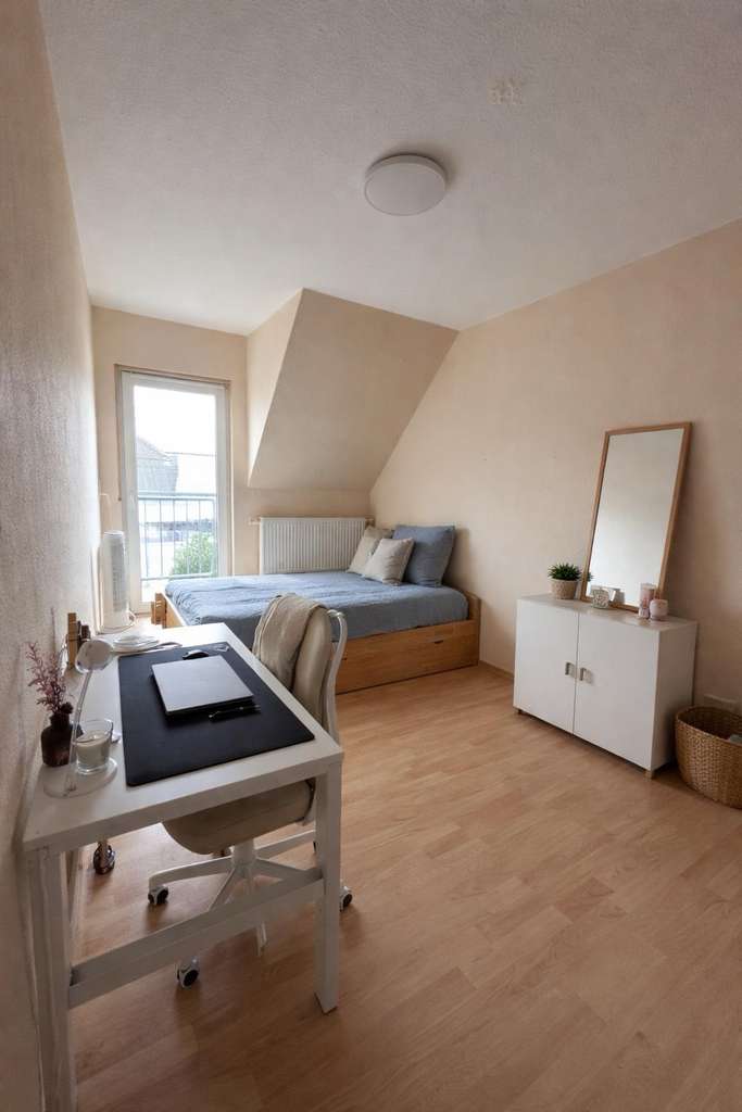 Immobilie in Kirchheim an der Weinstraße - Gepflegtes Reihenmittelhaus mit Garage in Feldrandlage - Bild 2