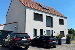 Design trifft Natur: KfW 55 Einfamilienhaus am Bürgerbusch mit Premium Ausstattung