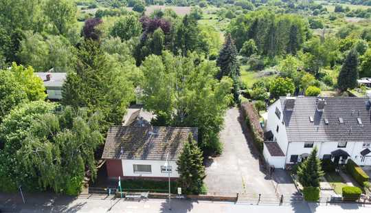 Bild von Einfamilienhaus auf großzügigem Grundstück mit Entwicklungspotential