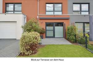 Modernes & energieeffizientes Reihenmittelhaus mit beheizter Garage, Garten & Glasfaser in Laagberg