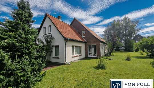 Bild von Familienidyll im Grünen – Einfamilienhaus mit Einliegerwohnung