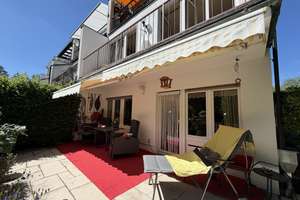 Helle Erdgeschosswohnung mit Wintergarten, großer Terrasse und wunderschönem Garten in München-Laim
