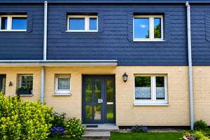 Wohnen, wo Familien sich wohlfühlen – Reihenhaus mit Garten, Balkon und Garage