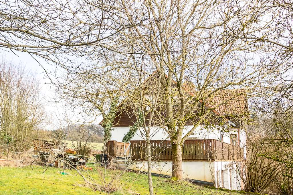 Immobilie in Üdersdorf - Einfamilienhaus mit vermieteter Einliegerwohnung, wunderschönem Garten, großer Terrasse und Garage. - Bild 4