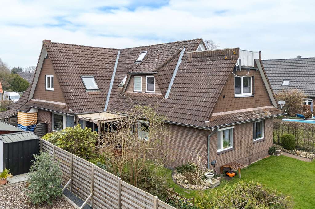 Immobilie in Apen - Vermietetes 3-Parteienhaus in zentraler Lage von Augustfehn, Obj. 9553 - Bild 3