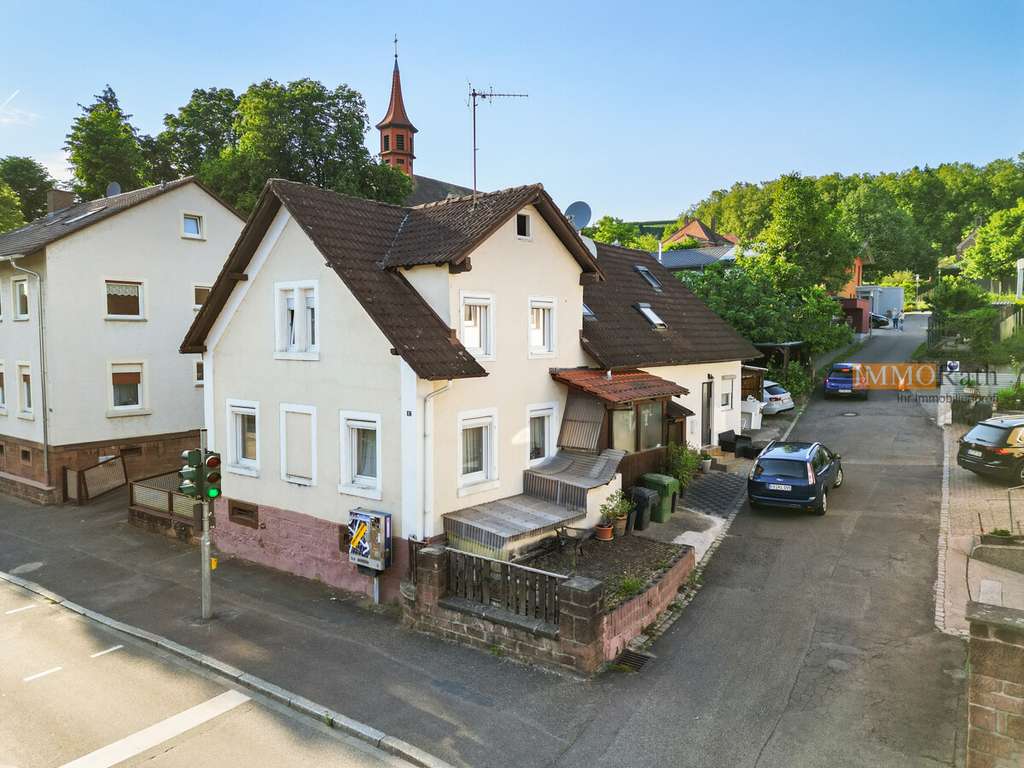 IMMORath.de - Einfamilienhaus mit Einliegerwohnung – Wohnen und Vermieten unter einem Dach!