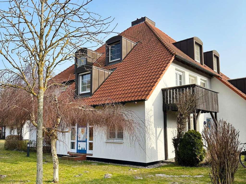 Immobilie in Prerow - Erdgeschosswohnung mit Terrasse und freiem Wiesenblick - Bild 0