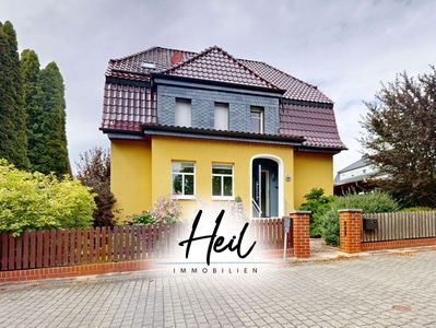 Wohnen in ruhiger Lage – Einfamilienhaus mit Garten | Garage | zwei Carports