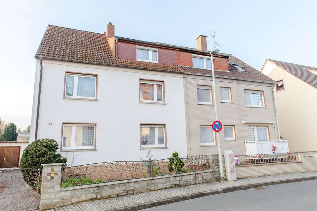 Immobilie in Flörsheim - Flörsheim: Vollvermietetes Dreifamilienhaus in angenehmer Wohnlage! - Bild 0