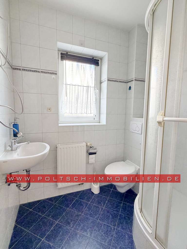 Immobilie in Bad Köstritz - Doppelhaushälfte mit Terrasse und Keller in ruhiger Lage von Bad Köstritz, BJ 2002 - Bild 0