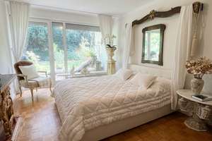 Charmante 3-Zimmer-Souterrainwohnung mit Terrasse und Blick ins Grüne in München-Bogenhausen