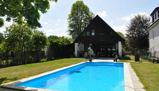 Bild von Lichtdurchflutetes Einfamilienhaus auf großzügigem Grundstück in familienfreundlicher Seitenstraße