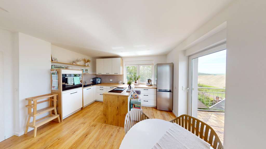 Immobilie in Kölleda - Außergewöhnliche Doppelhaushälfte mit Fernblick und Gartenidylle - Bild 1