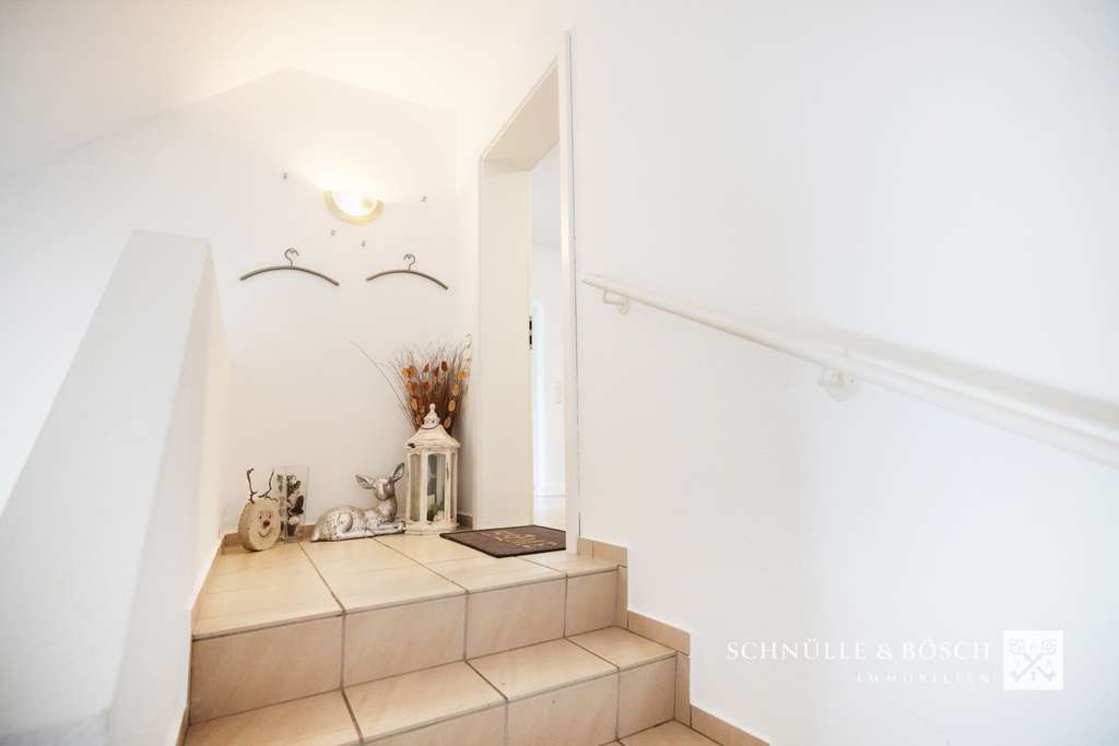 Immobilie in Deinste - Großzügige Eigentumswohnung mit Doppelcarport in Fredenbeck - Bild 1