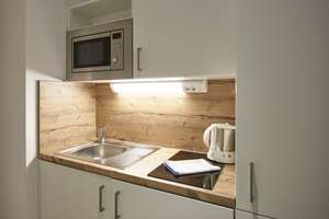 1 Zimmer Apartment mit Balkon in München/Riem möbliert ab 01.07.26 (fix) für mindestens 6 Monate – Willy-Brandt-Allee 14, 81829 Messestadt Riem, München – Vorschaubild 4