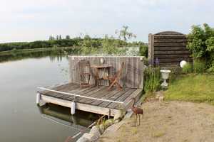 Gepflegtes Wassergrundstück mit zwei Ferienhäuser auf Eigentumsland, Strand, Steg und Outdoorküche – Müritz (Kreis) – Vorschaubild 21
